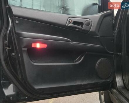 Чорний Cанг Йонг Actyon, об'ємом двигуна 2.3 л та пробігом 190 тис. км за 4700 $, фото 13 на Automoto.ua