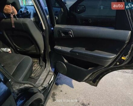 Черный Cанг Йонг Актион, объемом двигателя 2.3 л и пробегом 180 тыс. км за 4500 $, фото 9 на Automoto.ua