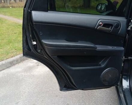 Черный Cанг Йонг Актион, объемом двигателя 2 л и пробегом 200 тыс. км за 5500 $, фото 7 на Automoto.ua