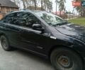 Черный Cанг Йонг Актион, объемом двигателя 2 л и пробегом 200 тыс. км за 5500 $, фото 6 на Automoto.ua