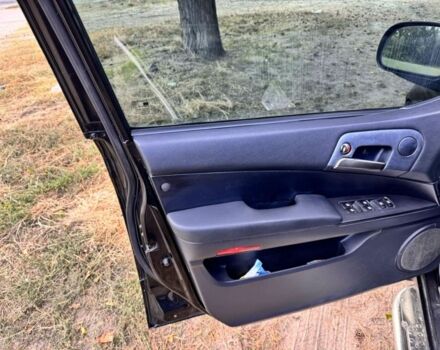 Черный Cанг Йонг Актион, объемом двигателя 2 л и пробегом 240 тыс. км за 8200 $, фото 4 на Automoto.ua