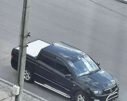 Черный Cанг Йонг Актион, объемом двигателя 2 л и пробегом 240 тыс. км за 8200 $, фото 6 на Automoto.ua