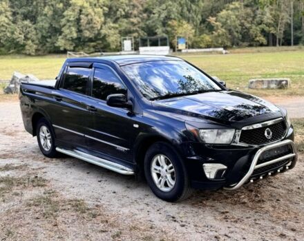 Черный Cанг Йонг Актион, объемом двигателя 2 л и пробегом 240 тыс. км за 8200 $, фото 1 на Automoto.ua