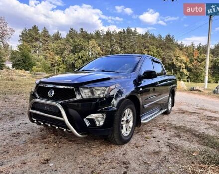 Черный Cанг Йонг Актион, объемом двигателя 2 л и пробегом 240 тыс. км за 8700 $, фото 1 на Automoto.ua