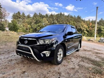 Черный Cанг Йонг Актион, объемом двигателя 2 л и пробегом 240 тыс. км за 8200 $, фото 1 на Automoto.ua