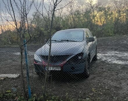 Красный Cанг Йонг Актион, объемом двигателя 2 л и пробегом 201 тыс. км за 2616 $, фото 1 на Automoto.ua