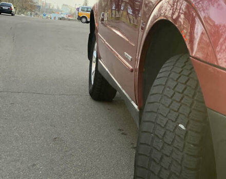 Красный Cанг Йонг Актион, объемом двигателя 2 л и пробегом 125 тыс. км за 6200 $, фото 12 на Automoto.ua