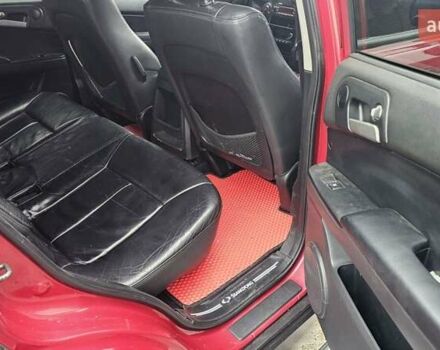 Красный Cанг Йонг Актион, объемом двигателя 2 л и пробегом 170 тыс. км за 4600 $, фото 16 на Automoto.ua