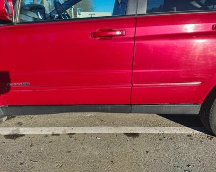 Красный Cанг Йонг Актион, объемом двигателя 2 л и пробегом 197 тыс. км за 5300 $, фото 2 на Automoto.ua