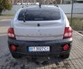Серый Cанг Йонг Актион, объемом двигателя 2 л и пробегом 101 тыс. км за 8000 $, фото 3 на Automoto.ua