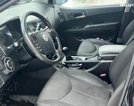 Черный Cанг Йонг Кирон Делюкс, объемом двигателя 2 л и пробегом 285 тыс. км за 4490 $, фото 16 на Automoto.ua