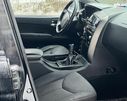 Черный Cанг Йонг Кирон Делюкс, объемом двигателя 2 л и пробегом 285 тыс. км за 4490 $, фото 29 на Automoto.ua