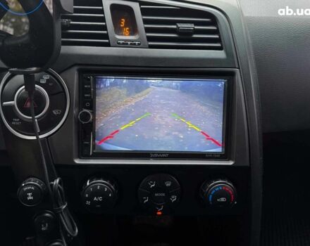 Сірий Cанг Йонг KYRON DELUXE, об'ємом двигуна 2 л та пробігом 220 тис. км за 8390 $, фото 16 на Automoto.ua