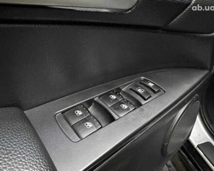 Сірий Cанг Йонг KYRON DELUXE, об'ємом двигуна 2 л та пробігом 220 тис. км за 8390 $, фото 11 на Automoto.ua