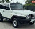 Белый Cанг Йонг Корандо, объемом двигателя 2.3 л и пробегом 265 тыс. км за 6999 $, фото 1 на Automoto.ua