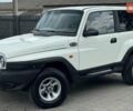 Белый Cанг Йонг Корандо, объемом двигателя 2.3 л и пробегом 265 тыс. км за 6999 $, фото 1 на Automoto.ua