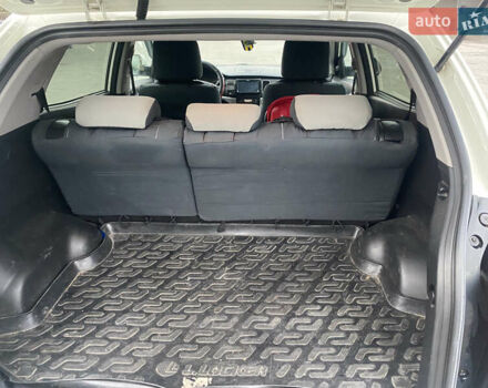 Белый Cанг Йонг Корандо, объемом двигателя 2 л и пробегом 240 тыс. км за 8000 $, фото 5 на Automoto.ua