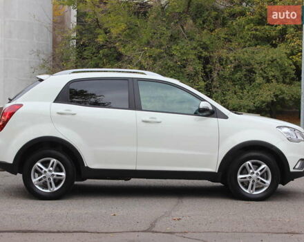 Белый Cанг Йонг Корандо, объемом двигателя 2 л и пробегом 62 тыс. км за 11400 $, фото 3 на Automoto.ua