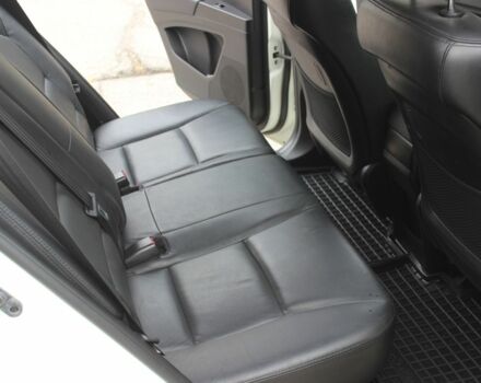 Белый Cанг Йонг Корандо, объемом двигателя 2 л и пробегом 62 тыс. км за 11300 $, фото 7 на Automoto.ua