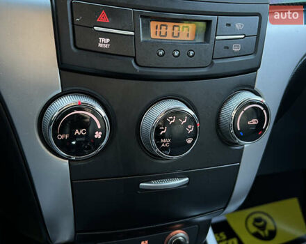 Белый Cанг Йонг Корандо, объемом двигателя 2 л и пробегом 155 тыс. км за 9800 $, фото 15 на Automoto.ua