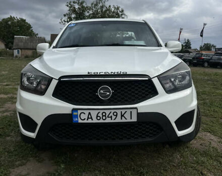 Белый Cанг Йонг Корандо, объемом двигателя 2 л и пробегом 123 тыс. км за 14000 $, фото 9 на Automoto.ua