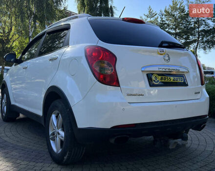 Белый Cанг Йонг Корандо, объемом двигателя 2 л и пробегом 155 тыс. км за 9800 $, фото 4 на Automoto.ua