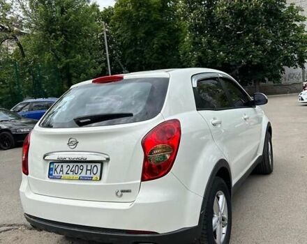 Білий Cанг Йонг Korando, об'ємом двигуна 2 л та пробігом 158 тис. км за 8600 $, фото 10 на Automoto.ua