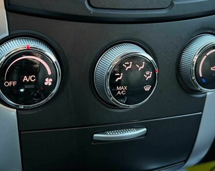 Белый Cанг Йонг Корандо, объемом двигателя 2.3 л и пробегом 155 тыс. км за 9800 $, фото 15 на Automoto.ua