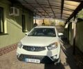 Белый Cанг Йонг Корандо, объемом двигателя 2 л и пробегом 97 тыс. км за 10500 $, фото 4 на Automoto.ua