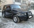 Чорний Cанг Йонг Korando, об'ємом двигуна 2.3 л та пробігом 260 тис. км за 6900 $, фото 1 на Automoto.ua