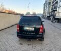 Черный Cанг Йонг Корандо, объемом двигателя 2.7 л и пробегом 310 тыс. км за 6199 $, фото 15 на Automoto.ua