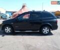 Чорний Cанг Йонг Korando, об'ємом двигуна 2 л та пробігом 263 тис. км за 7500 $, фото 11 на Automoto.ua