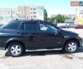 Чорний Cанг Йонг Korando, об'ємом двигуна 2 л та пробігом 263 тис. км за 7500 $, фото 13 на Automoto.ua