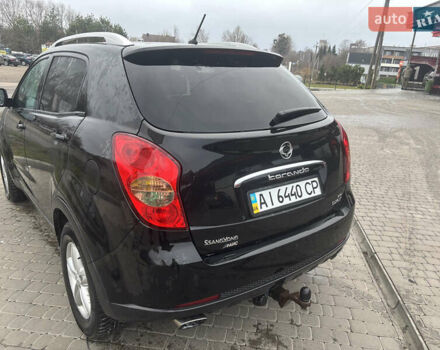 Черный Cанг Йонг Корандо, объемом двигателя 2 л и пробегом 168 тыс. км за 7900 $, фото 11 на Automoto.ua