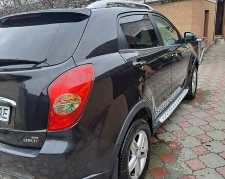 Черный Cанг Йонг Корандо, объемом двигателя 2 л и пробегом 138 тыс. км за 8800 $, фото 2 на Automoto.ua