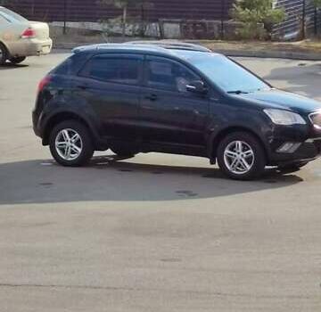 Чорний Cанг Йонг Korando, об'ємом двигуна 2 л та пробігом 216 тис. км за 7995 $, фото 10 на Automoto.ua