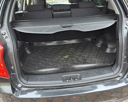 Черный Cанг Йонг Корандо, объемом двигателя 2 л и пробегом 138 тыс. км за 8800 $, фото 6 на Automoto.ua