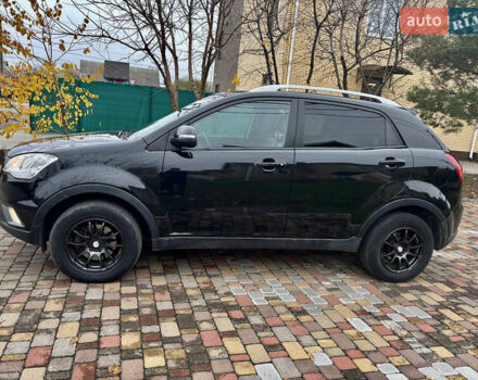 Черный Cанг Йонг Корандо, объемом двигателя 2 л и пробегом 168 тыс. км за 7200 $, фото 16 на Automoto.ua