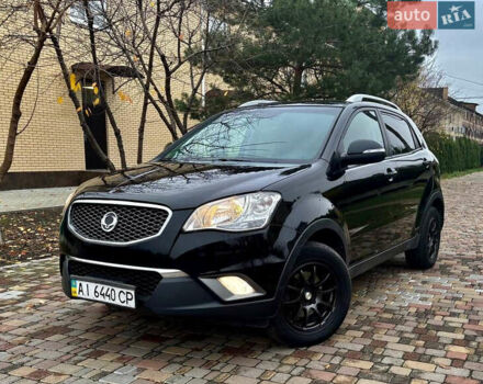 Черный Cанг Йонг Корандо, объемом двигателя 2 л и пробегом 168 тыс. км за 7200 $, фото 11 на Automoto.ua