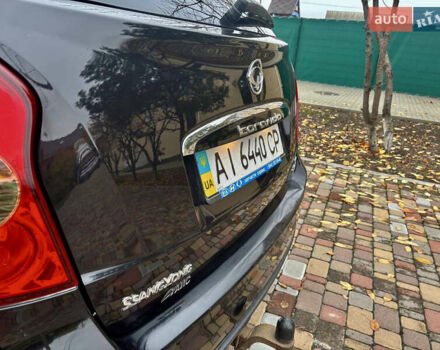 Черный Cанг Йонг Корандо, объемом двигателя 2 л и пробегом 168 тыс. км за 7200 $, фото 23 на Automoto.ua