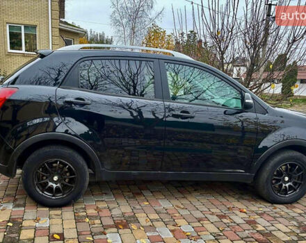 Черный Cанг Йонг Корандо, объемом двигателя 2 л и пробегом 168 тыс. км за 7200 $, фото 43 на Automoto.ua