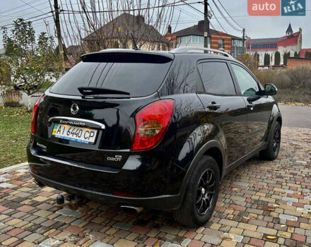 Черный Cанг Йонг Корандо, объемом двигателя 2 л и пробегом 168 тыс. км за 7200 $, фото 35 на Automoto.ua