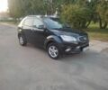 Черный Cанг Йонг Корандо, объемом двигателя 2 л и пробегом 189 тыс. км за 8200 $, фото 1 на Automoto.ua