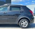 Чорний Cанг Йонг Korando, об'ємом двигуна 2 л та пробігом 208 тис. км за 7690 $, фото 7 на Automoto.ua