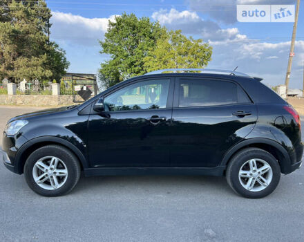 Чорний Cанг Йонг Korando, об'ємом двигуна 2 л та пробігом 190 тис. км за 8499 $, фото 3 на Automoto.ua