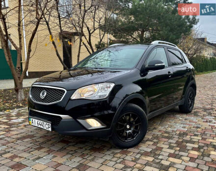 Черный Cанг Йонг Корандо, объемом двигателя 2 л и пробегом 168 тыс. км за 7200 $, фото 12 на Automoto.ua