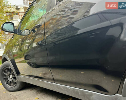 Черный Cанг Йонг Корандо, объемом двигателя 2 л и пробегом 168 тыс. км за 7200 $, фото 14 на Automoto.ua