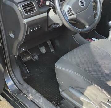 Чорний Cанг Йонг Korando, об'ємом двигуна 2 л та пробігом 216 тис. км за 7995 $, фото 23 на Automoto.ua