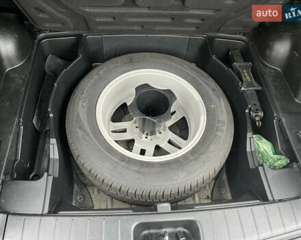 Черный Cанг Йонг Корандо, объемом двигателя 2 л и пробегом 168 тыс. км за 7200 $, фото 28 на Automoto.ua