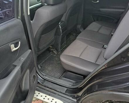 Черный Cанг Йонг Корандо, объемом двигателя 2 л и пробегом 138 тыс. км за 8800 $, фото 5 на Automoto.ua